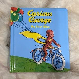 Curious George My First Bike (padded board book)  by H. A. Rey Hardcover